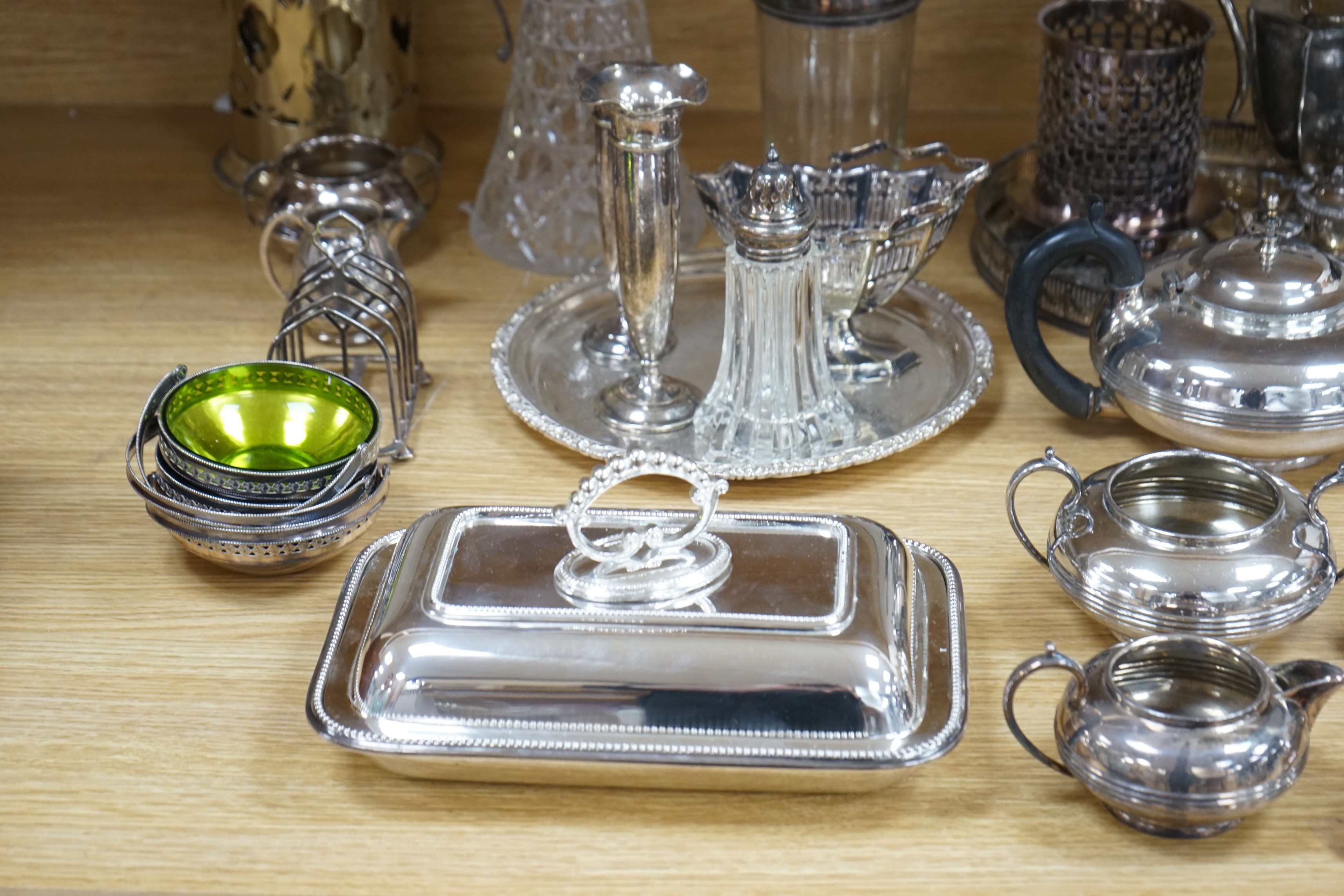 A quantity of silver plate including a cocktail shaker and a ewer